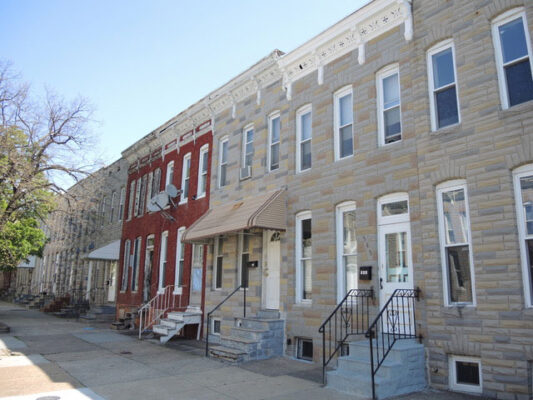 The red house on Woodyear Street with the wooden steps where he lived from age 2-6.