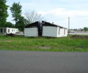 On my first visit in 2003, the house across the street was split in half. The sign proclaiming "Renovation in Progress" was stolen off Mantle's front porch. Plans for a museum were scrapped.