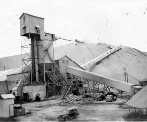 The landscape was littered with gigantic bleached dunes of toxic mineral waste.