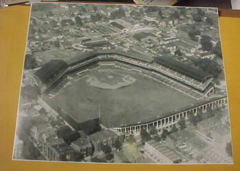 Griffith Stadium was built in 1911 on the site of what had once been a Civil War hospital for injured Freedmen and later National Park, home of the Senators from 1892-1899. The concrete bleachers and scoreboard in left field were added later.